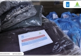 Distributed home essentials packages—including blankets, mattresses, and winter clothing